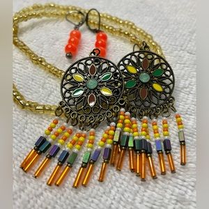 Two pairs of Earrings and two bracelets. Boho or Western look